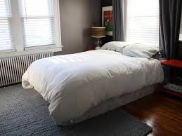 Plus i wanted the bed to look beautiful unmade as well as made and it does. Cover Your Boxspring With An Easy Fabric Wrap How Tos Diy