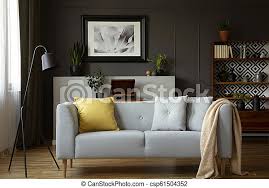 The perfect pillow if you're looking for superior support while you sleep. Comfy Sofa With Grey And Yellow Pillows Lamp Painting And Cupboard In A Living Room Interior Real Photo Canstock
