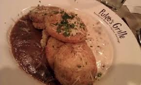 Fried Green Tomatoes From Puleo S Grille Piled On Cheese Grits With Tasso Gravy And Sawmill Gravy Oooh Yum Tomato Dishes Tasso Recipe Food