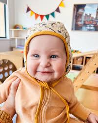 6 months old 🍊 This sweet baby girl is already half a year old! She's  crawling everywhere, pulling up and standing, getting into everything and  loves to explore! She loves all her