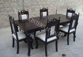Pineapples and acanthus leaves grace the arm chairs. Dining Table Set Buy Wooden Dining Table Set Online In Best Designs Furniture Online Buy Wooden Furniture For Every Home Sunrise International