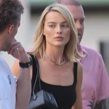 Margot Robbie's Parisian Outfit Featured A $170 Skirt From This Australian Label - marieclaire.com.au