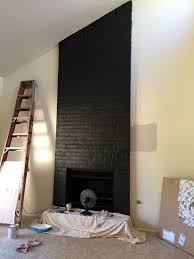 Satin Black Paint Enlivens This Brick Fireplace Black Brick Fireplace Black Fireplace Wall Fireplace Remodel