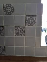 The floor tiles are a cooler dark grey. Wilko One Coat Pale Grey Tile Gloss Paint 750ml Wilko