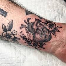 This heart on sleeve tattoo just screams christianity, with the cross and crown of thorns. That Inspires And Other Stuff When You Wear Your Heart On Your Sleeve Thank