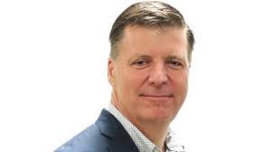 Former Pallister chief of staff signs