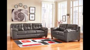It's neutral which makes for a sound wall color choice because it works with many other colors that you might incorporate such as blue, orange, yellow, white, black, etc. Furniture Gray Leather Couch Design Ideas Youtube