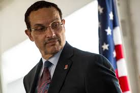 Issue of race looms over Machen's crackdown