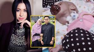 Ainul mardhiah yang menghidap penyakit germ cell tumor menerima pasport siang tadi daripada jabatan imegresen malaysia. Dr Amalina Bantu Ainul