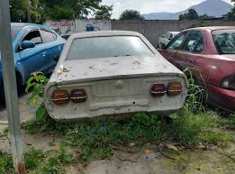 Image result for Earth Green 1974 Mazda