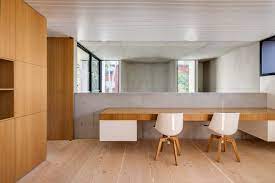 The stacking of the elements of the facade are contrasted by the seeming point loading at the exterior. Gallery Of Glebe House Nobbs Radford Architects 14