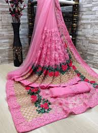 These threads are further woven into fabrics primarily made up of silk to create intricate patterns. Desirable Pink Color Diamond Moti Embroidered Zari Work Soft Net Saree Blouse For Women Onlinesari