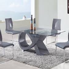 A dining room table is an important part of your home. Impress Rectangular Shaped Glass Expendable Dining Table With Stainless Steel Le Contemporary Dining Room Sets Modern Glass Dining Table Modern Dining Room Set