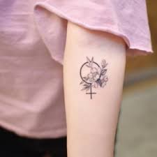 Explore stotker's photos on flickr. The Female Symbol In Tattoo Art Fertility Feminist Ideologies And Love