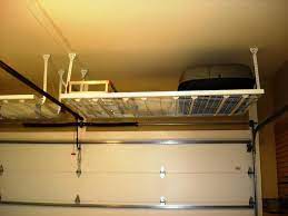 Best Garage Ceiling Storage Ideas Plansjayne Atkinson Homes Overhead Garage Storage Garage Storage Shelves Garage Storage