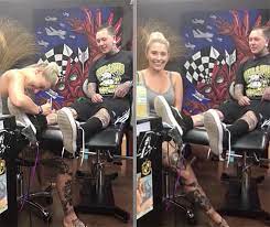 Also in that same photo is a man with a hand tattoo some people were confused by. Denver Tattoo Artist Proposes With You Guessed It A Tattoo Video Amasses 12 Million Views The Jeweler Blog
