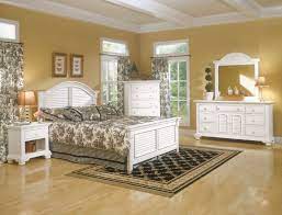 Soft touches and light colors can be welcoming, which is important for a room in which you can get some rest. Cottage Traditions White Panel Bedroom Set Bedroom Panel Furniture Bedroom Design
