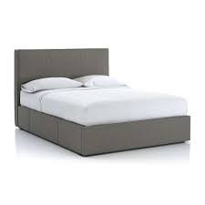 Transmute the aesthetics of your bedroom setting with this bed. Flange Queen Upholstered Headboard With Storage Base Grey Crate And Barrel