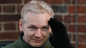 Press card in Assange's cap crucial