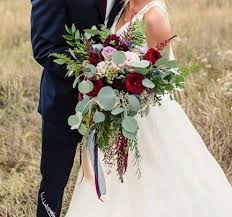 Market stalls brim with charcuterie and meats, succulent seafood, freshly picked fruits and vegetables, dairy products, fresh flowers, spices and nuts. Flowing Dynamic Burgundy Accent Bridal Bouquet Moore Flowers Wichita Bridal Bouquet Fresh Flower Bouquets Bridal