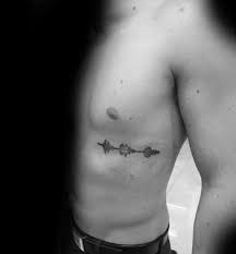 The tattoo on the rib cage is one of the most original variants in tattooing. Cross Rib Cage Rib Tattoos For Guys Novocom Top