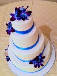 At blue lace cakes, we believe your wedding is not the place for a boring cake, that's why we work with all of our couples to design a cake to fit their wedding vision and to showcase their style. Topaz Blue Purple Orchid And White Wedding Cake Lolo S Cakes Sweets