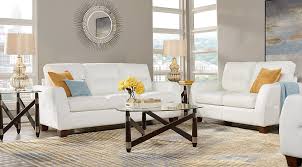 One of the easiest ways to add in some color is with a blue living room rug. Blue White Yellow Living Room Furniture Decorating Ideas