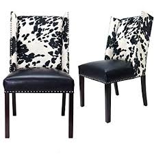 Check out our black side chair selection for the very best in unique or custom, handmade pieces from our chairs & ottomans shops. Sole Designs Rexford Faux Cowhide Leather And Fabric Upholstered Dining Side Chair Nailhead Trim Set Of 2 Chairs Black White Amazon In Home Kitchen