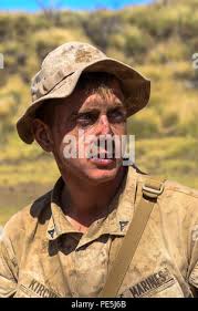 Lance Cpl. Jordan Kirchner, a squad leader with 3rd Platoon, Kilo Company,  3rd Battalion, 3rd Marine Regiment, speaks to Marines during training  exercise Lava Viper, a staple of their pre-deployment training, at