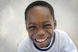 Haitian boy healing from major back surgery