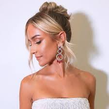 Then wrap one section into a bun and the second section around it. 11 Easy Ways To Style Short Hair In 10 Minutes Or Less Brit Co