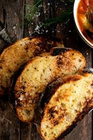 Add half of base to each pot; Seafood Cioppino With Charred Bread The Original Dish