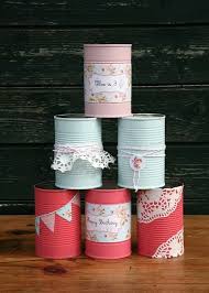 Und das ist die gute gelegenheit mit ihrem kind tolle sachen aus papier zu basteln. Aluminum Tins Six Cans Stacked In A Pyramid Colored In Salmon Pink Light Blue And Pastel Pink Decorated With St Tin Can Crafts Recycled Tin Cans Can Crafts