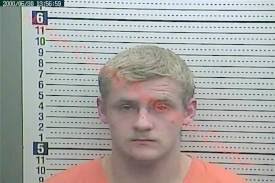 Teenager possessing gun, alcohol arrested