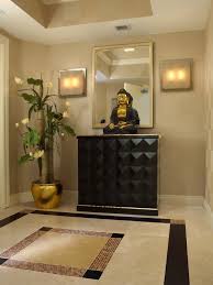 A collection of black and white artwork adds personality to this brand new home. Apartment Entrance Design Ideas Novocom Top