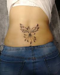 The term tramp stamp itself originated from the german term trampstehramp. 25 Fun Lower Back Tattoos That Reimagine The Tramp Stamp