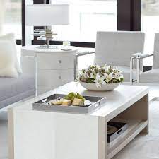 Fancy face top with linear white finish on top and sides. Cocktail Table Bernhardt