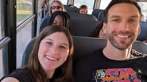 On our way to an amusement park. This was our last picture before the rain  started. The good news is the whole park will be a water park. Going to be a