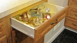 A secret compartment in the stairs…just for alcohol! Secret Storage In A Kitchen Cabinet Youtube