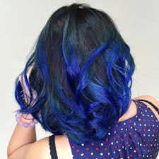 A black short bob with dark blue highlights that look unobtrusive and calming a black layered long bob with blue highlights and ends for a touch of rock Black Hair With Electric Blue Highlights Shortblackhairstyles Royal Blue Hair Blue Hair Highlights Hair Styles