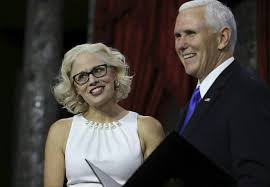 Kyrsten Sinema's outfit draws attention at Senate swearing-in