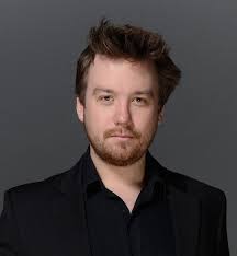 Nicholas Scott performs with Les Ambassadeurs