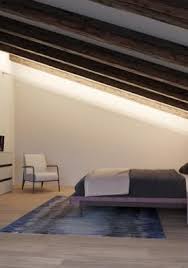 Metro Is A Minimal Profile Linear Lighting System That Is Designed To Continuously Illuminate Open Verti Corporate Interiors Painted Ceiling Light Architecture