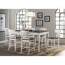 The perfect pick for small spaces, this set includes one rectangular table with four backless bar stools that slide easily underneath to save square footage when they're not in use. Farmhouse Counter Height Dining Table Set Off 55