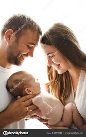 Happy Parents Holding Cute Naked Little Daughter Husband Wife Touching  Stock Photo by ©Mykola 367615326