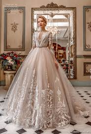 An illusion neckline wedding dress in princess skirt silhouette with sparkling jewel encrusted bodice, featuring fairytale layered tulle skirt and seductive v back. 30 Wedding Dresses You Loved This Year Wedding Inspirasi