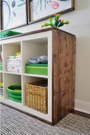 An Easy Ikea Hack Bookcase To Wood Wrapped Changing Table Young House Love Home Diy Ikea Diy Ikea Changing Table Hack