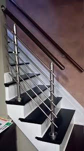 The Next Level 14 Stair Railings To Elevate Your Home Design Modern Stairs Modern Staircase Staircase Railings