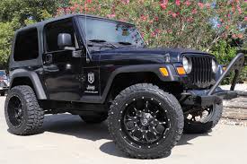 Image result for Brilliant Black 2005 Jeep