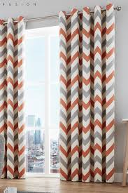 Buy Fusion Chevron Geo Lined Eyelet Curtains From The Next Uk Online Shop Orange Curtains Chevron Curtains Orange Curtains Living Room